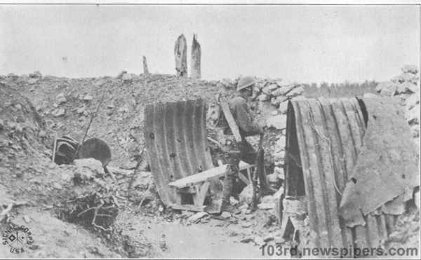 Guarding an old German 
dugout in which they suspect a trap or mine, until the arrival of mopping-up party.
Bois des Eparges, September 12, 1918